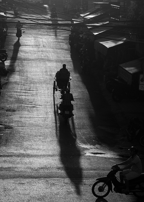 Nhiếp ảnh gia Nguyễn An Di - Street Life Loi ve xom nho 